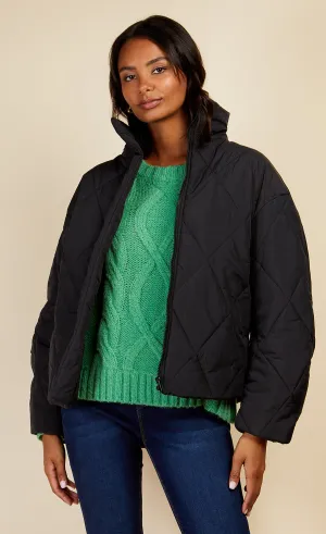 Black Quilted Puffer Jacket by Vogue Williams